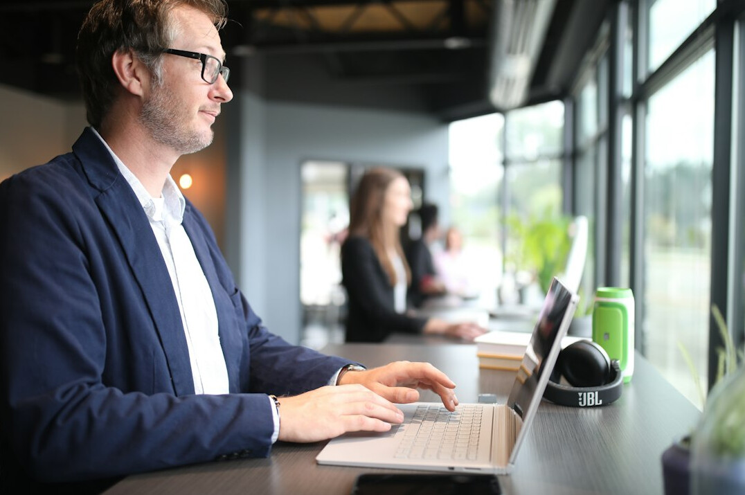person working at desk with focus
