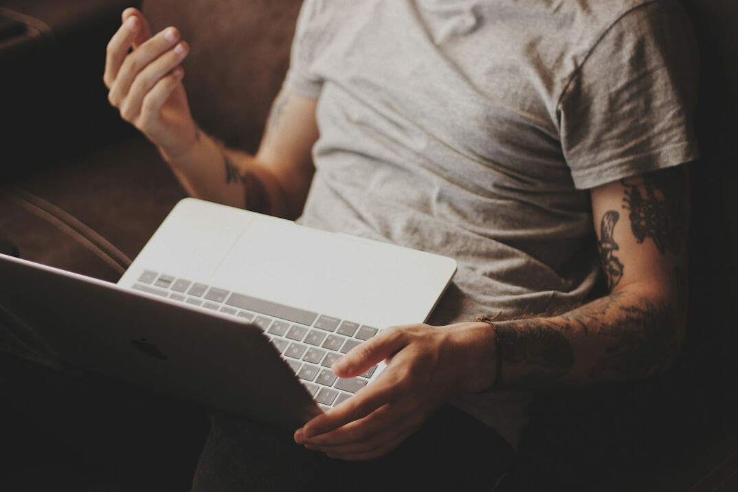 man studying online